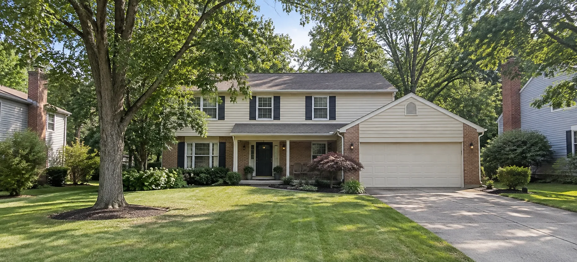Established Dublin, Ohio two-story home with a dated but well-kept exterior