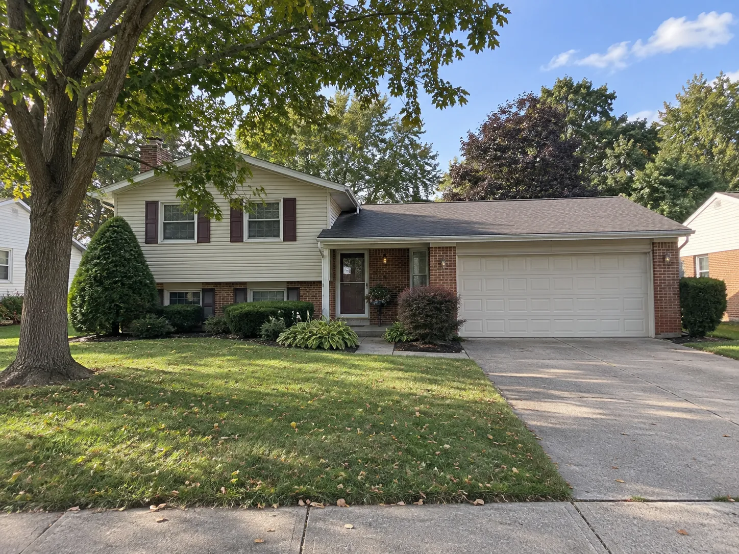 Established suburban home in Grove City, Ohio with dated exterior features