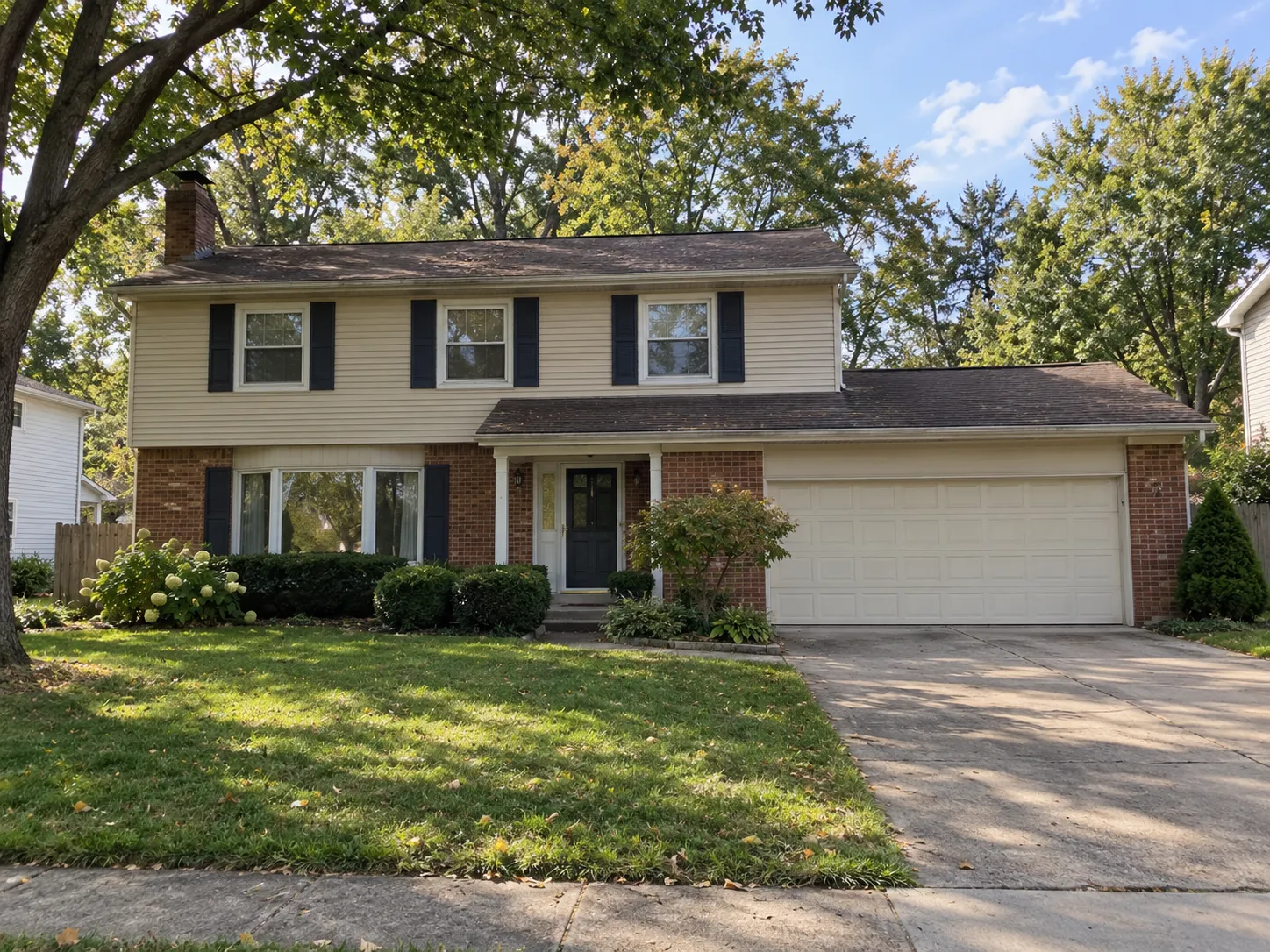 Established suburban home in Hilliard, Ohio with dated exterior features